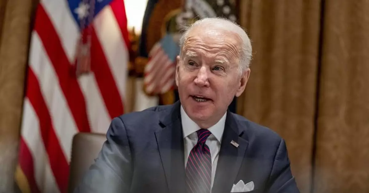 Analysis: Biden finds inflation overshadows strong economy