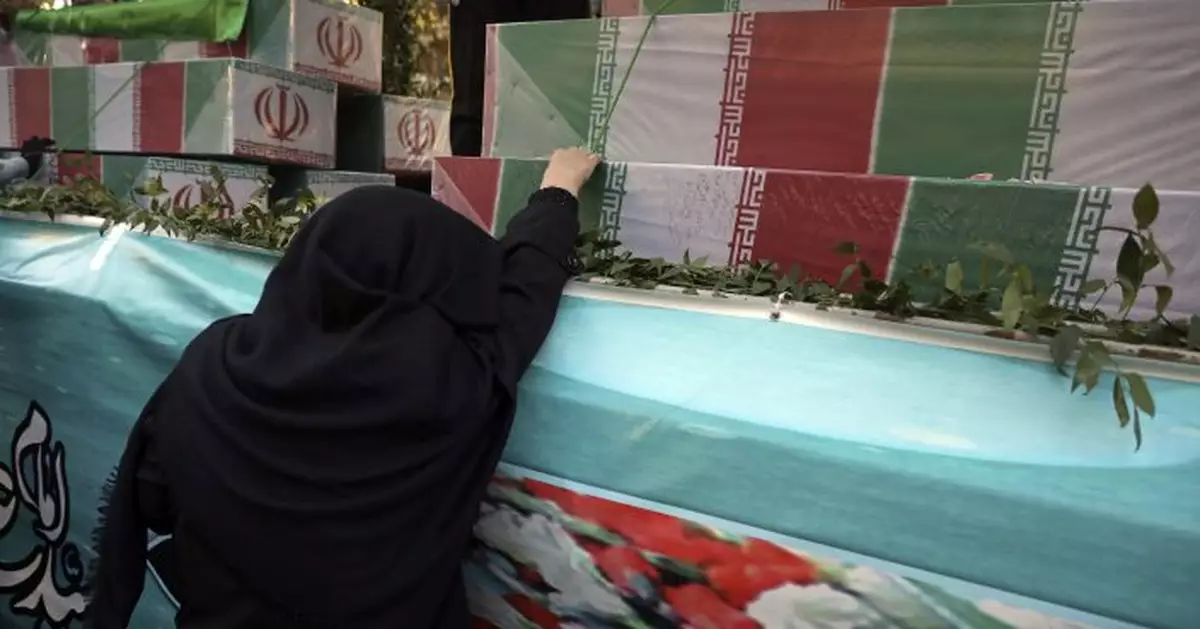 Iran holds mass funeral for &#039;80s war dead amid nuclear talks