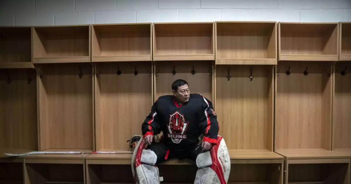 AP PHOTOS: Olympics get Chinese hockey veterans back on ice