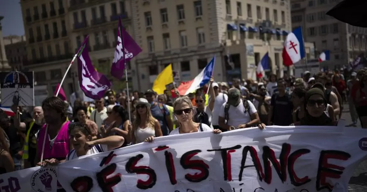 In France, anti-vax fury, politics make public service risky