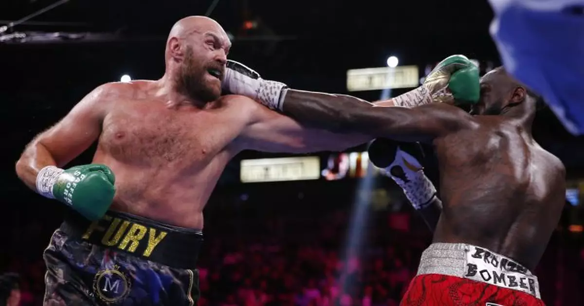 Fury says heavyweight title defense vs. Whyte on April 23