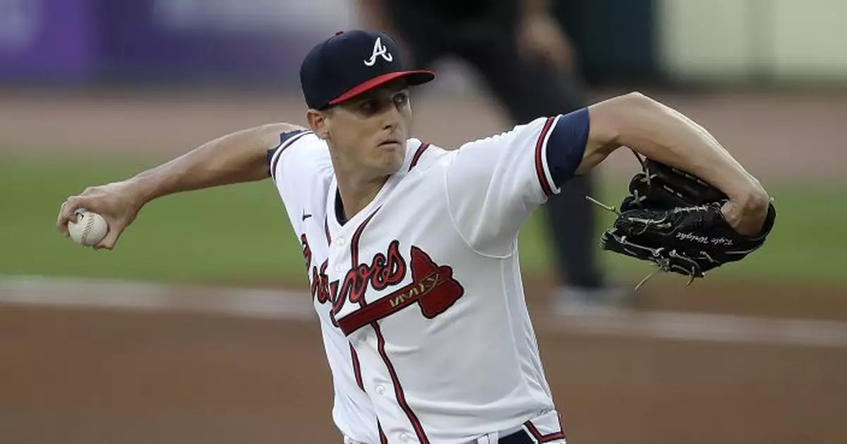 Wright fans 11, Olson drives in 2 as Braves beat Marlins 3-0