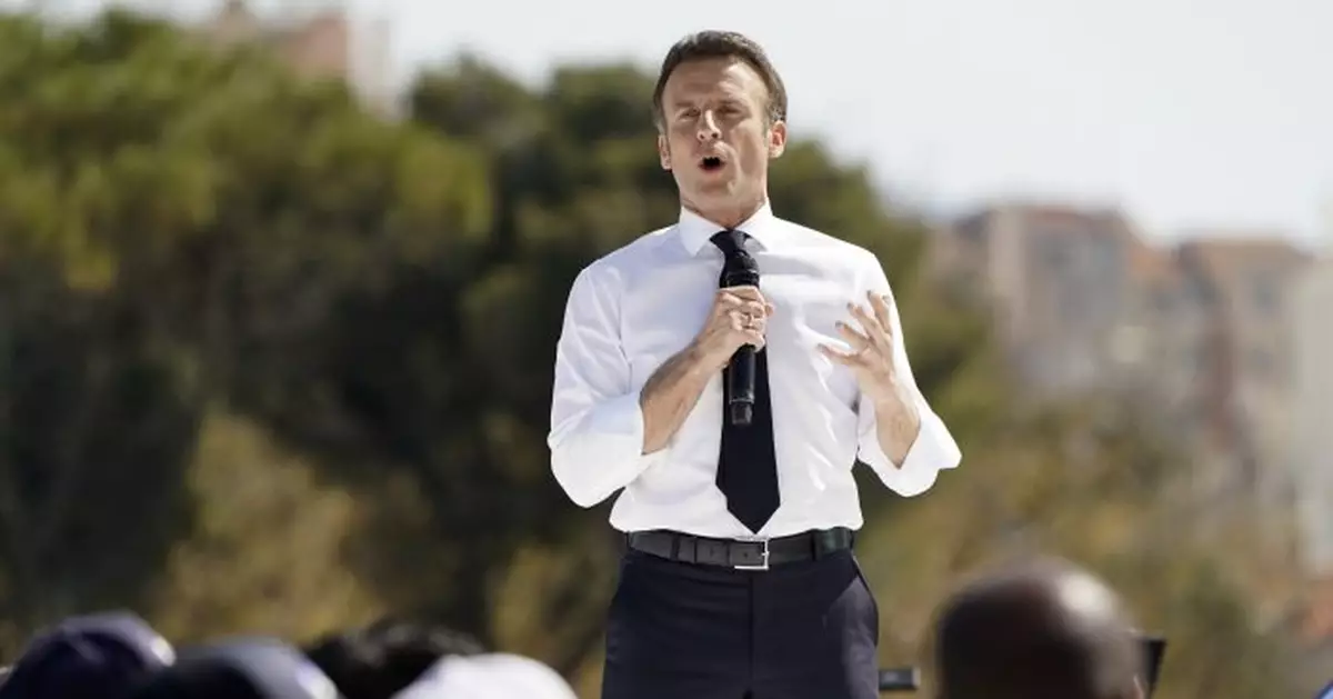 Macron courts Marseille voters; Climate activists in Paris