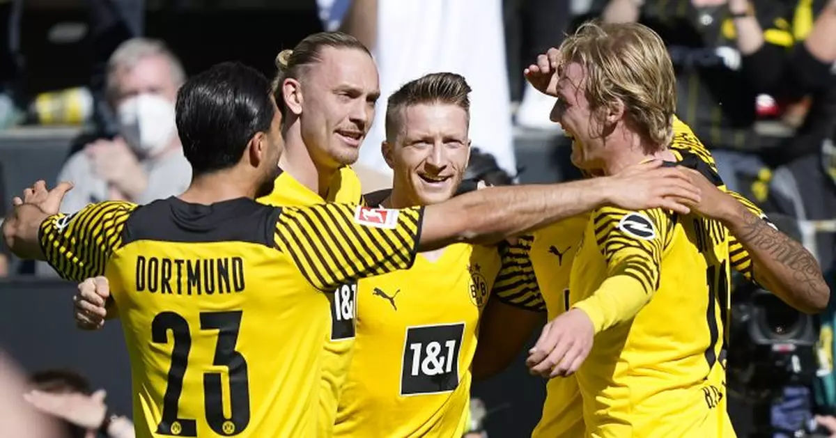 Haaland scores 2 as Dortmund routs Wolfsburg 6-1