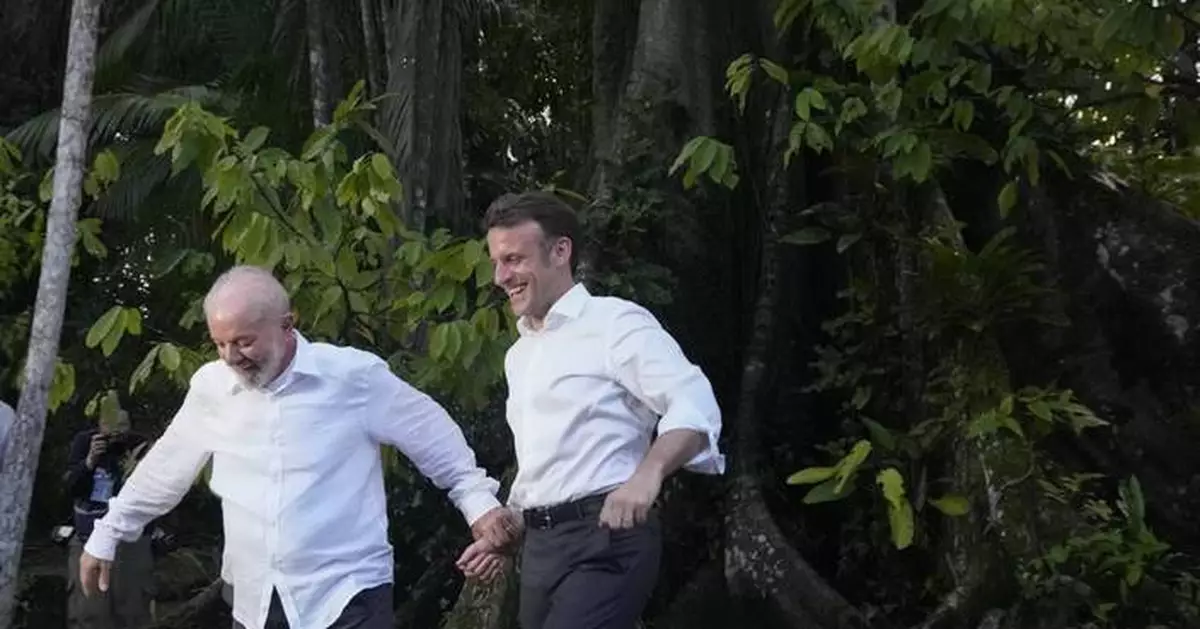 France's Macron embraces Brazil's Lula — and the memes poking fun at their 'wedding'