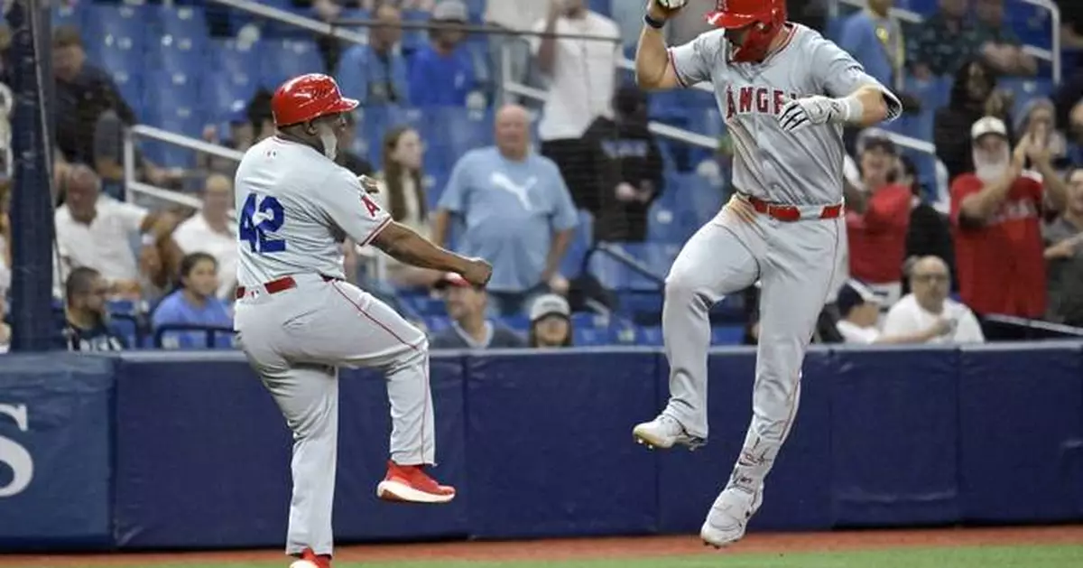 Mike Trout's 2-run homer highlights 5-run outburst in the 8th as the Angels top Rays 7-3