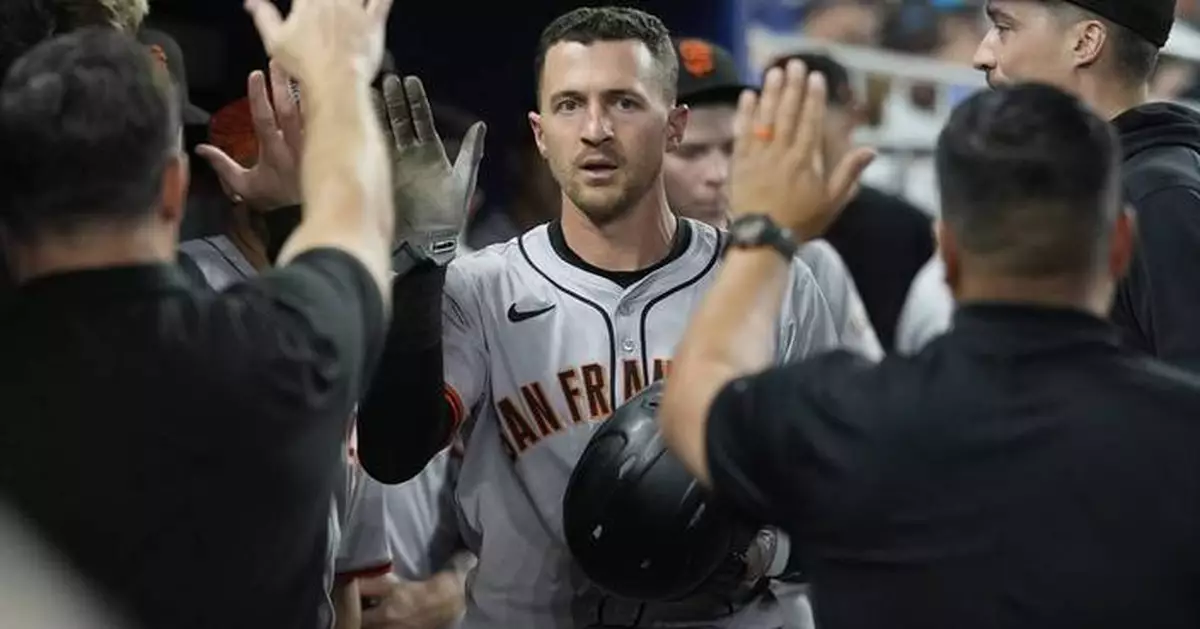 Giants rally with 3 runs in 7th to beat NL-worst Marlins. Miami manager Skip Schumaker is tossed