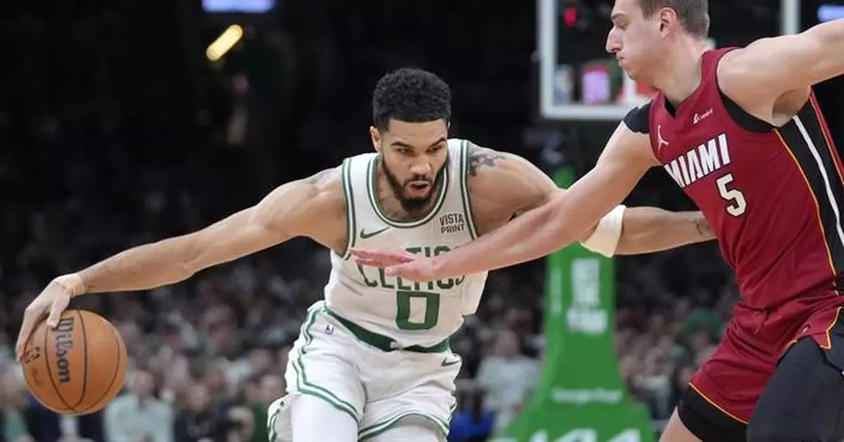Jayson Tatum triple-double, 3s lead Celtics past Butler-less Heat 114-94 in playoff opener