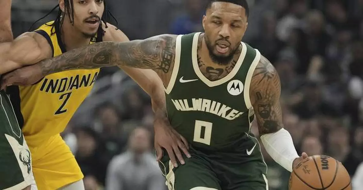 Damian Lillard's 35-point 1st half helps Bucks beat Pacers 109-94 without Giannis in playoff opener