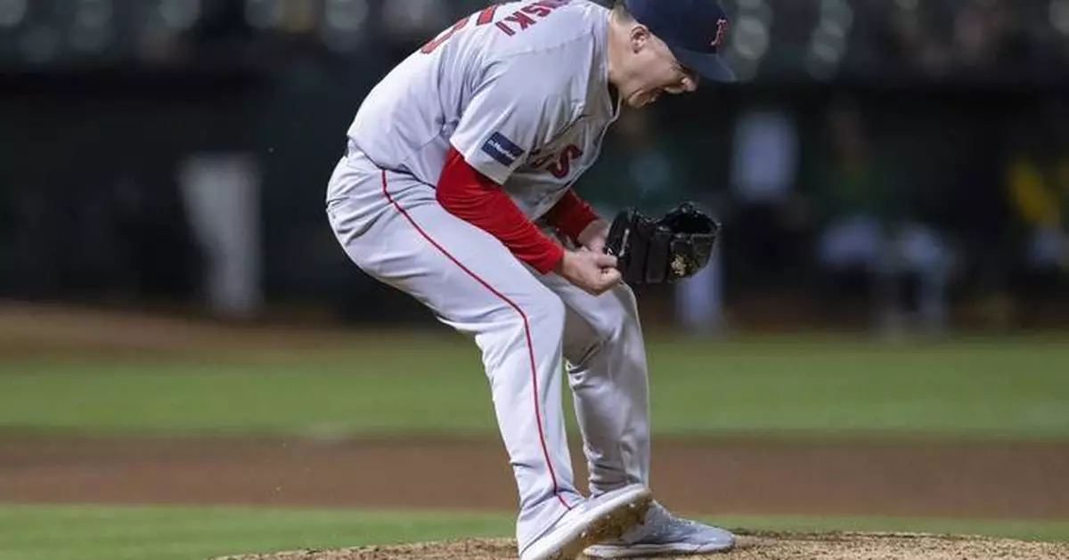 Trevor Story helps the Red Sox beat the Athletics 5-4 in 11 innings