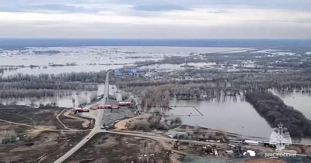 Water levels rise and homes flood in Russia after a dam bursts near the ...