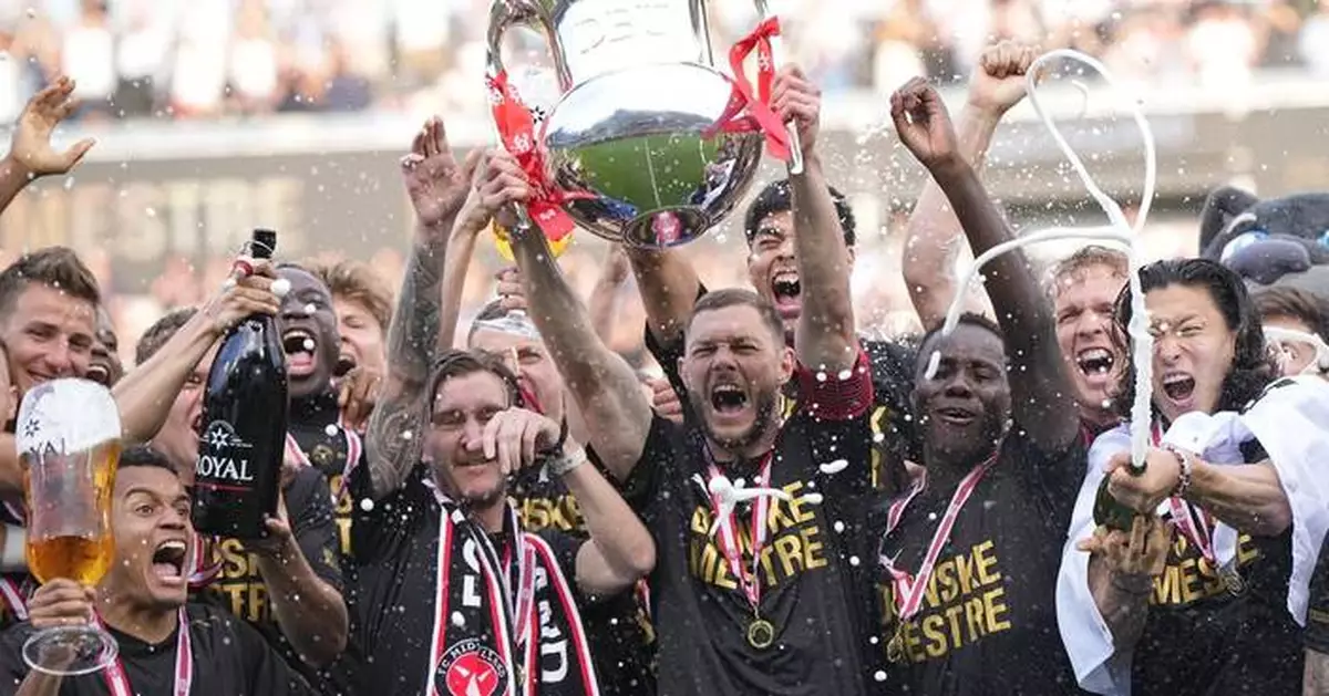 FC Midtjylland wins Danish league after final-day slip-up by Brondby. Kristoffer Olsson in the crowd