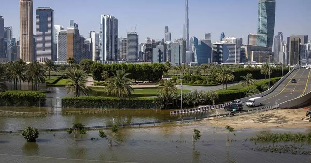 Flights to Dubai disrupted as rain hits the UAE 2 weeks after its heaviest recorded rainfall ever