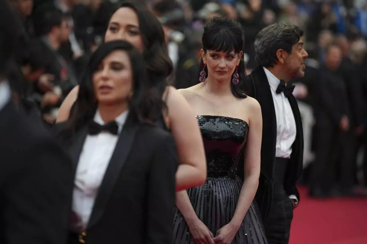 Jury member Eva Green poses for photographers upon arrival at the awards ceremony and the premiere of the film 'The Second Act' during the 77th international film festival, Cannes, southern France, Tuesday, May 14, 2024. (Photo by Daniel Cole/Invision/AP)
