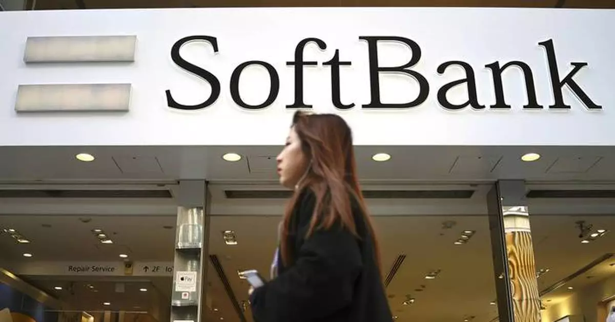 Japan's SoftBank Group trims investment losses but remains in red for fiscal year