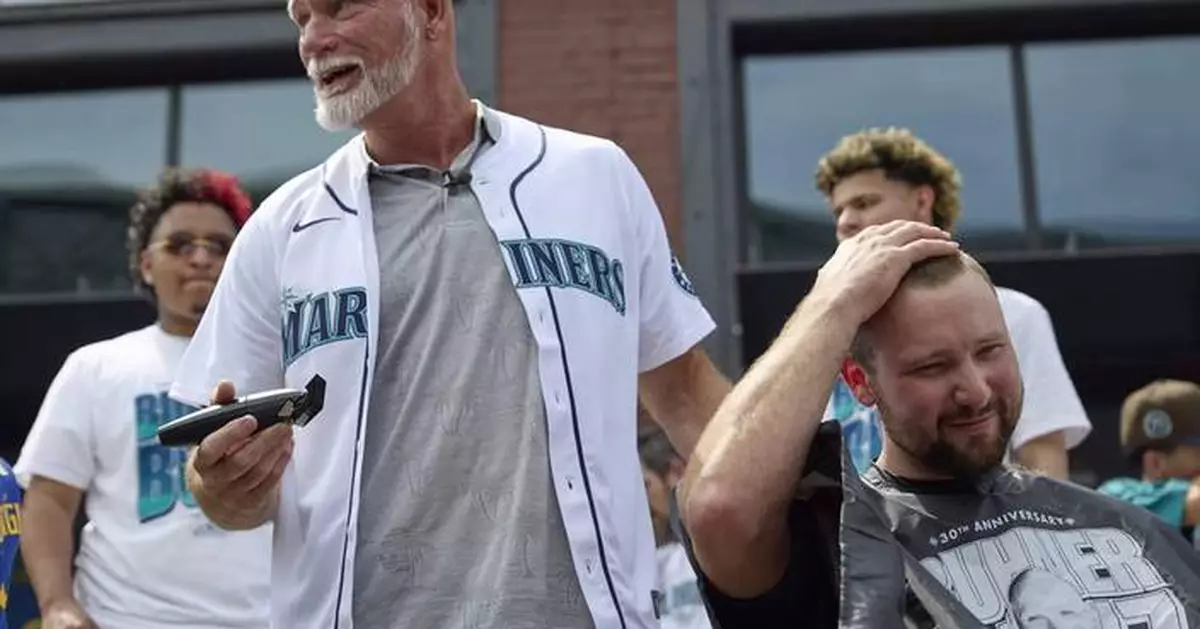 Cal Raleigh gets a trim as Mariners celebrate 30th anniversary of "Buhner Buzz Cut" night