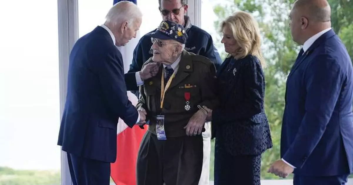 Biden calls for solidarity with Ukraine at D-Day anniversary ceremony near the beaches of Normandy