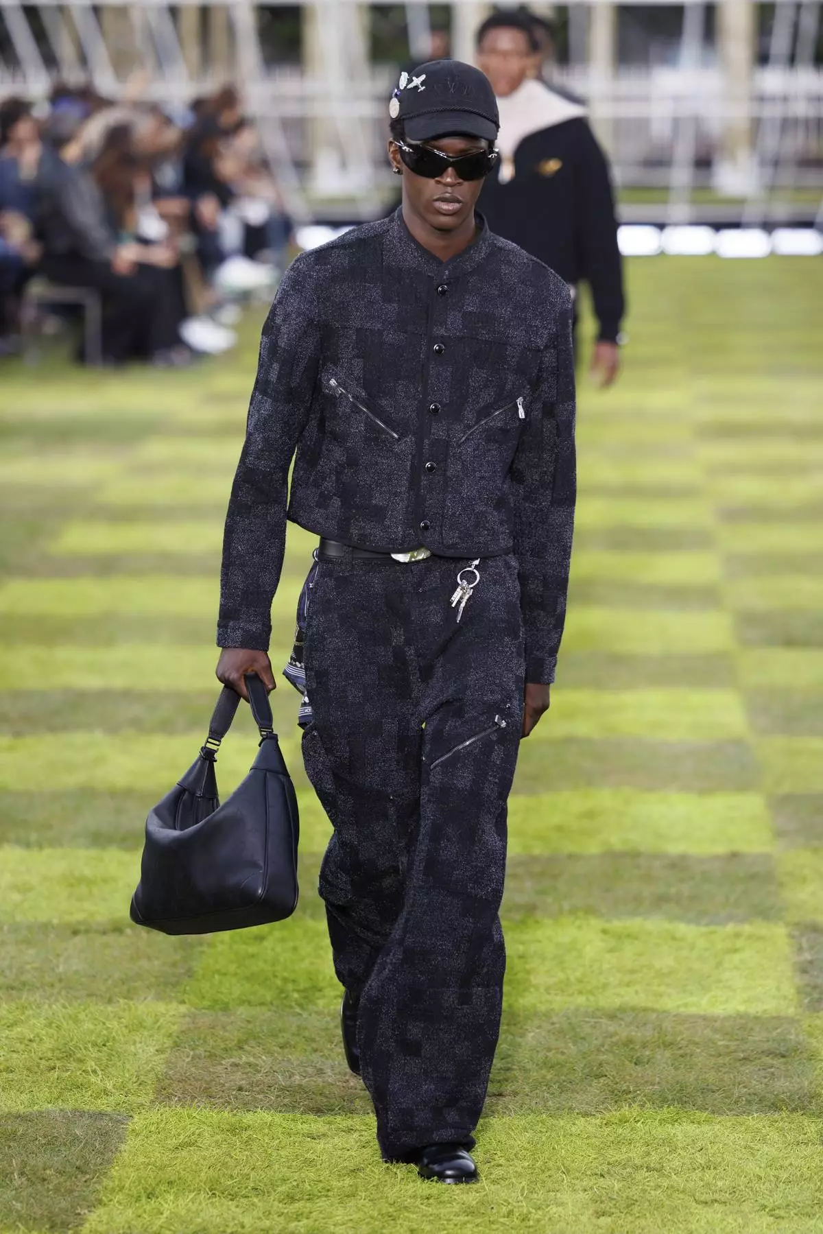 A model wears a creation as part of the Louis Vuitton Spring Summer 2025 collection, that was presented in Paris, France, Tuesday, June 18, 2024. (Photo by Vianney Le Caer/Invision/AP)