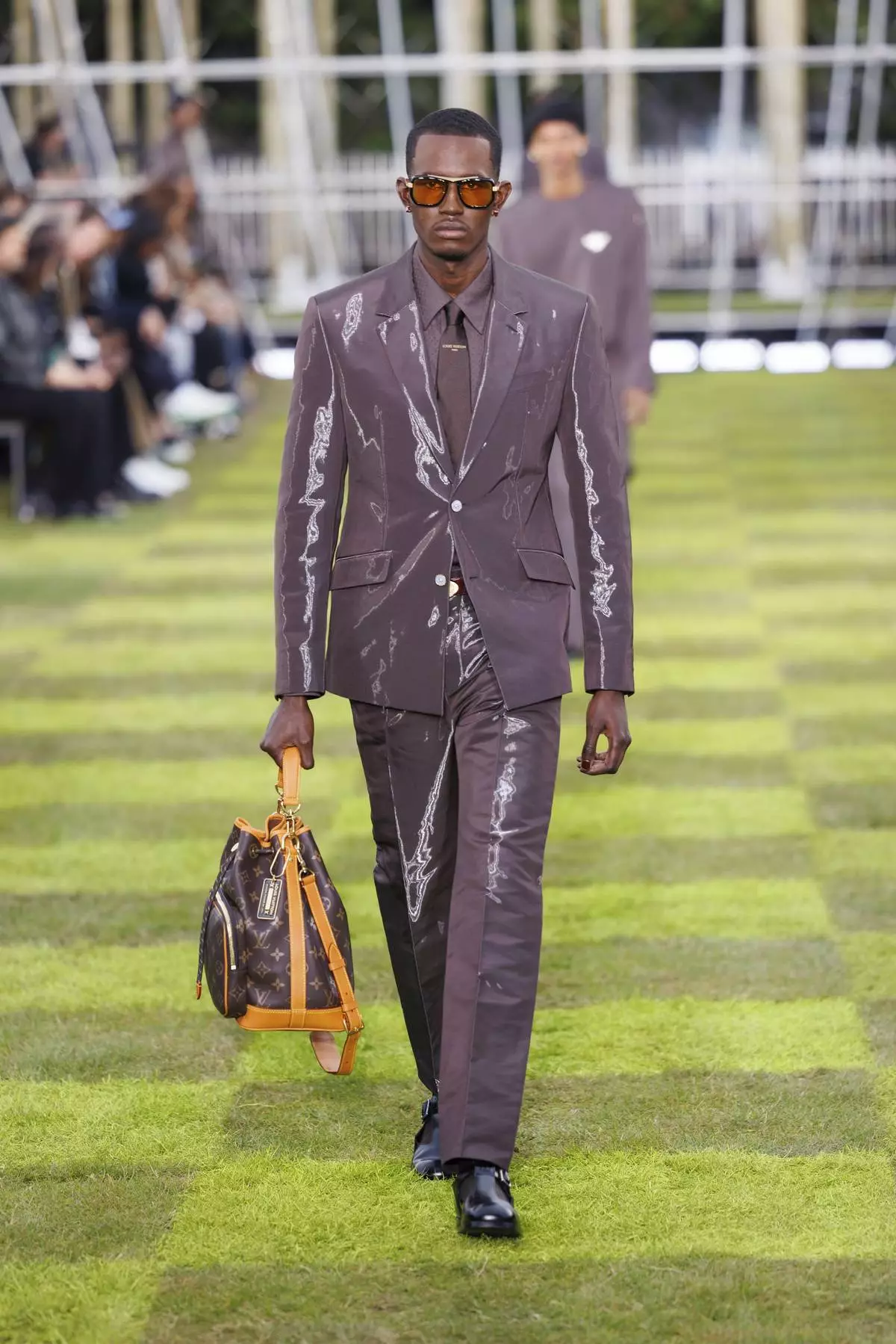 A model wears a creation as part of the Louis Vuitton Spring Summer 2025 collection, that was presented in Paris, Tuesday, June 18, 2024. (Photo by Vianney Le Caer/Invision/AP)