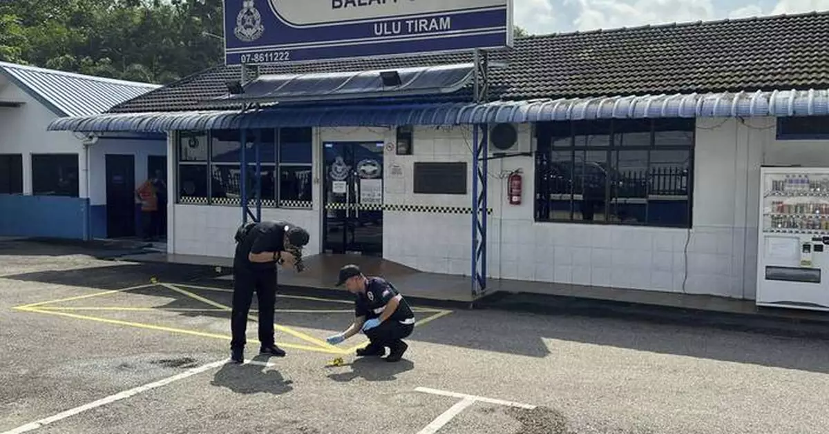 5 family members of Malaysian man who attacked police station face terrorism charges