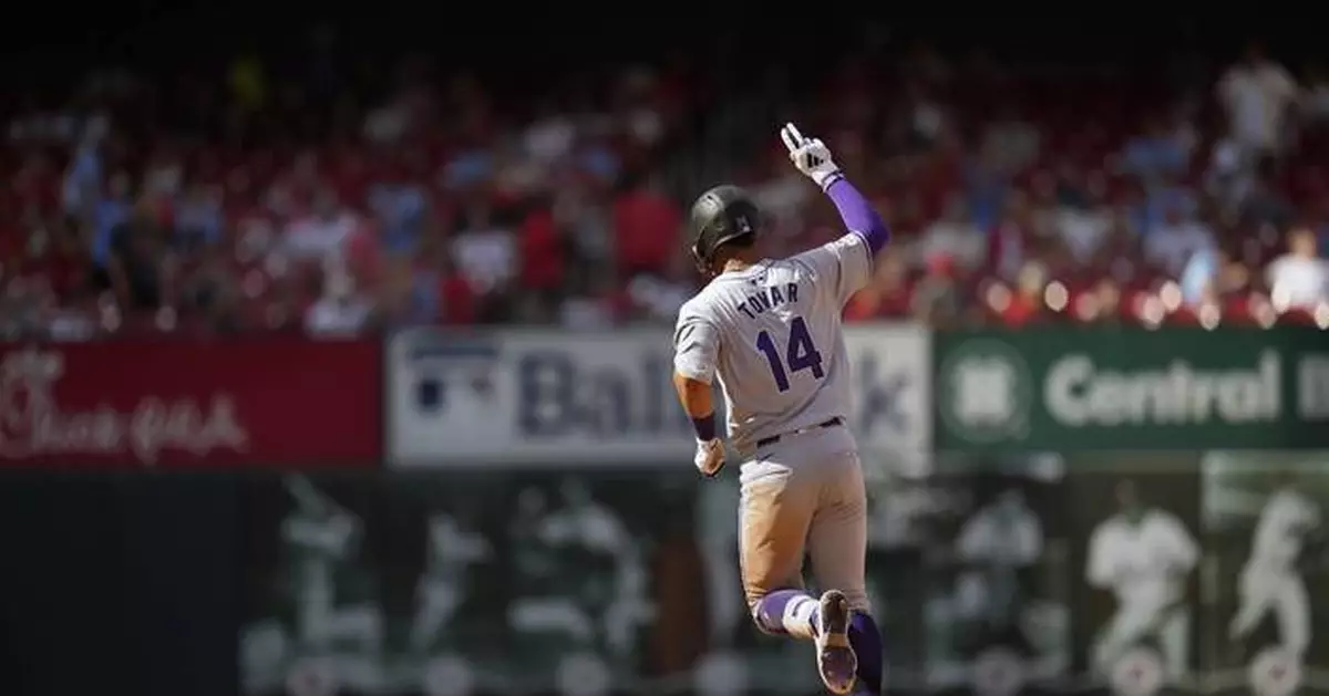 Tovar hits 2 home runs to lift Rockies to a 6-5 victory over Cardinals