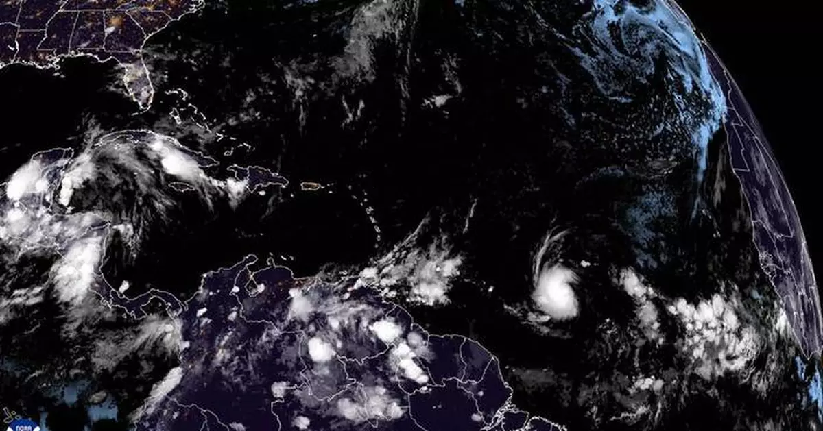 Beryl strengthens into hurricane in Atlantic, forecast to grow into major storm entering Caribbean