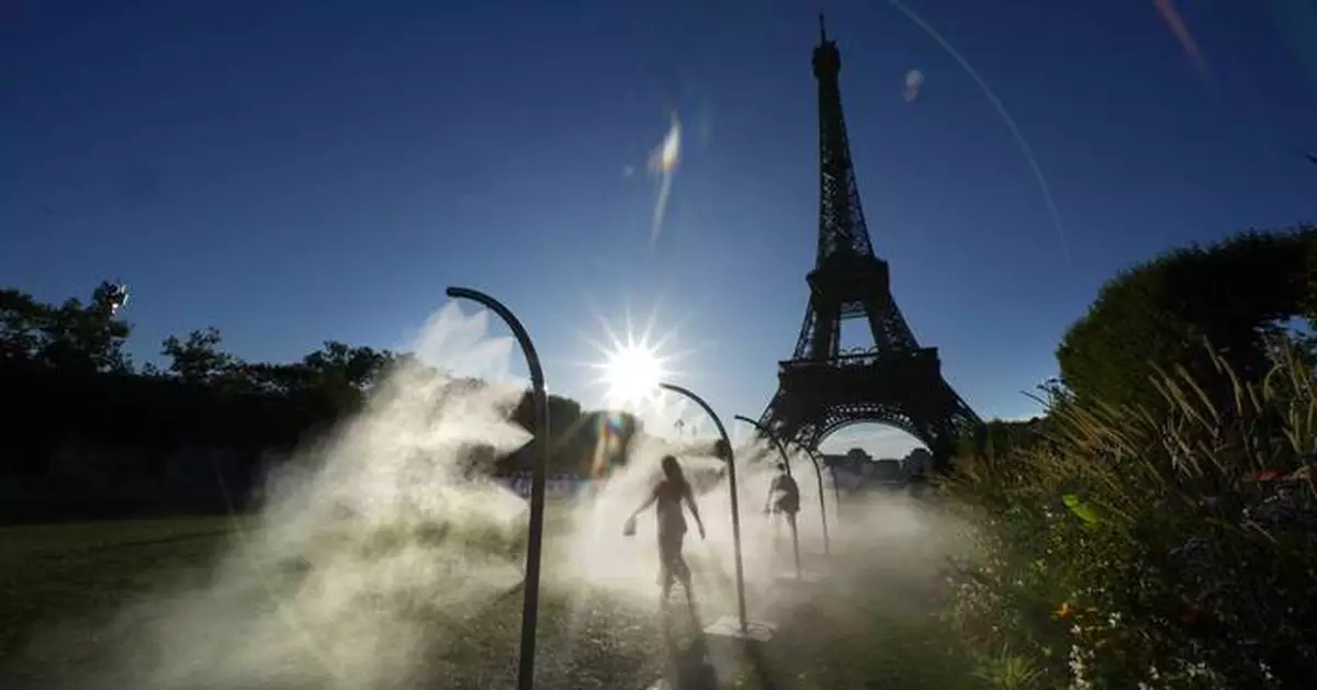 Paris Olympics brings out hoses and misters to cool down fans during heat wave