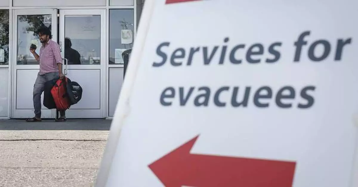 Fast-moving wildfire in the Canadian Rockies ravages the picturesque resort town of Jasper