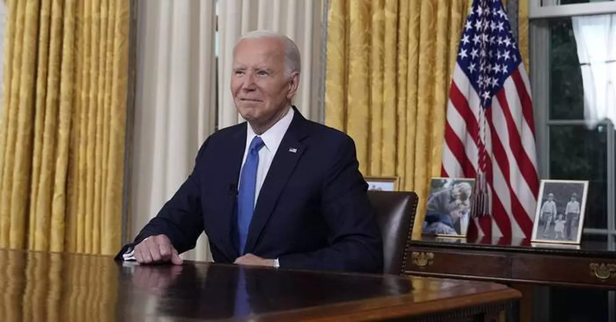 Biden signs bill strengthening oversight of crisis-plagued US Bureau of Prisons after AP reporting