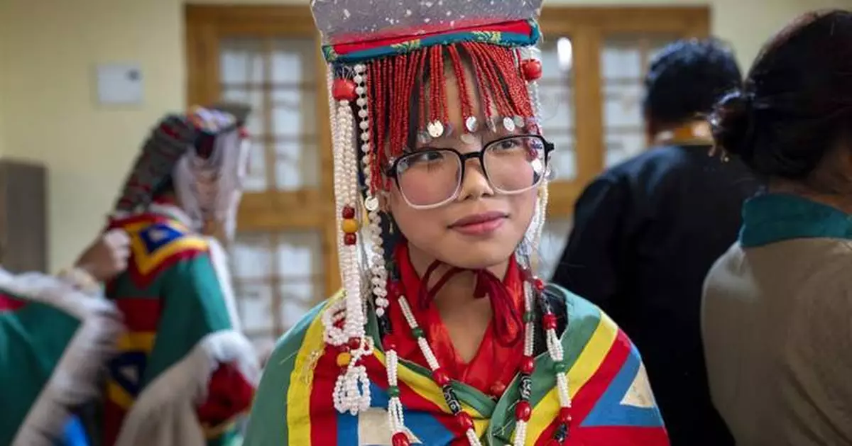 Hundreds of mostly exiled Tibetans celebrate the Dalai Lama's 89th birthday in India's Dharamshala