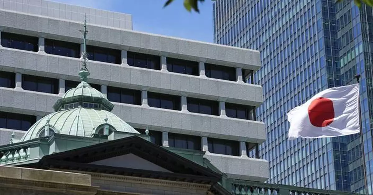 Bank of Japan raises its key interest rate, aiming to curb yen's slide against the dollar