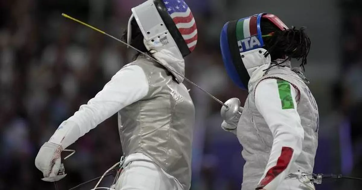 Kiefer earns 2nd Olympic gold in women's foil fencing with a victory over American teammate Scruggs