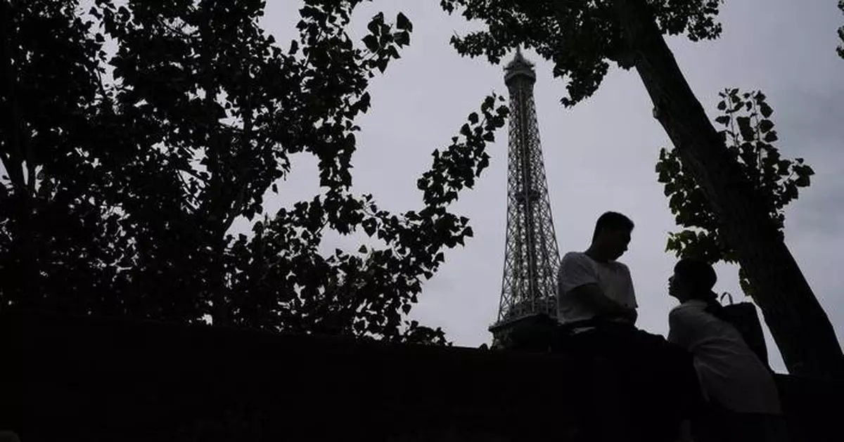 Rain, rain and more rain couldn't drown out the cheers at the Paris Olympics opening ceremony