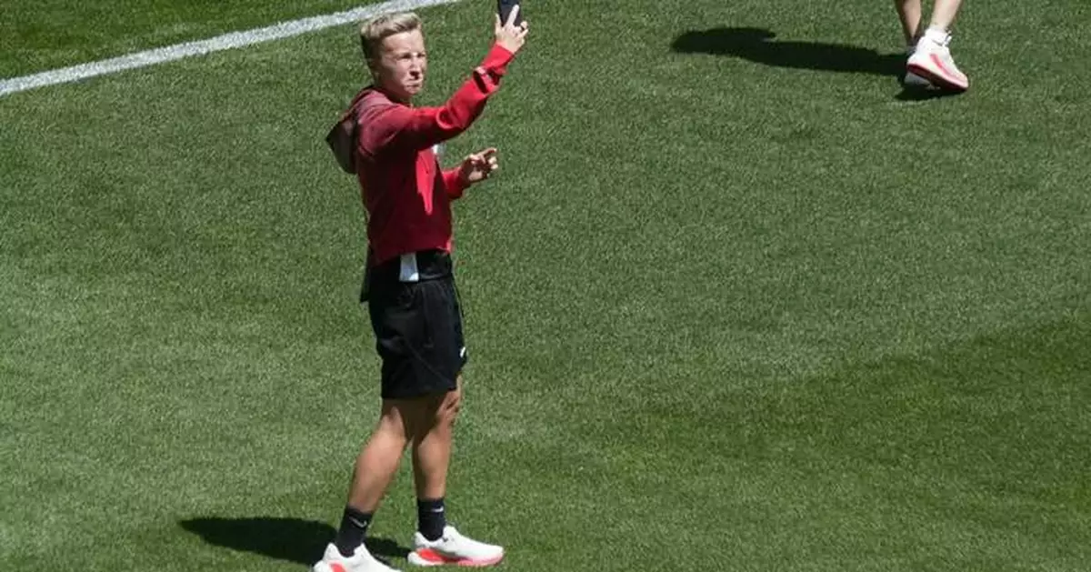 Canada women's soccer coach will step aside for the team's opener because of drone incidents