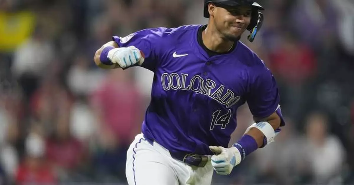 Tovar's single in 12th gives Rockies 9-8 win, extending Red Sox skid to 4