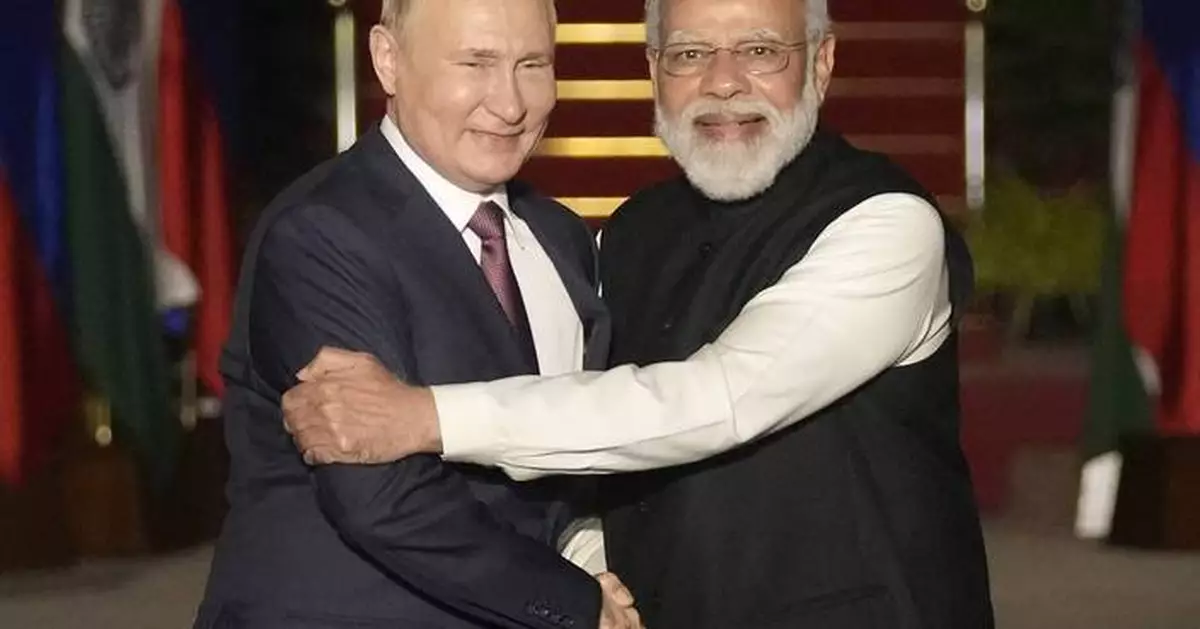 Putin meets Indian prime minister in Russia on his first visit since Moscow sent troops into Ukraine