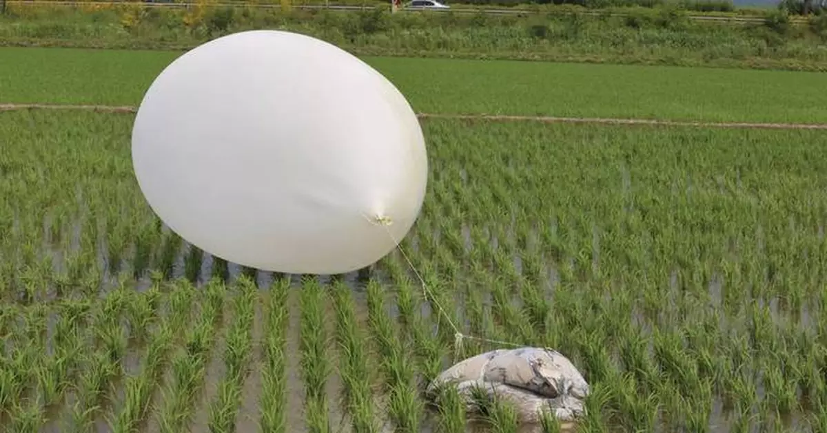 Trash dropped by a North Korean balloon falls on South Korea’s presidential compound