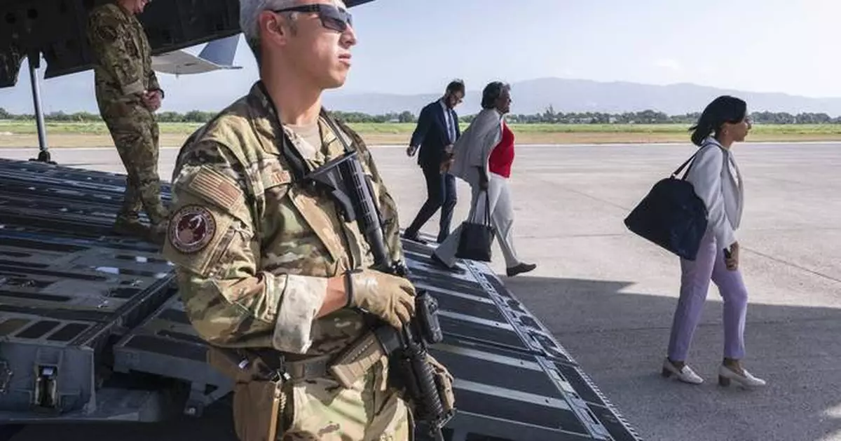 US ambassador announces $60 million in aid and new resources for police during visit to Haiti