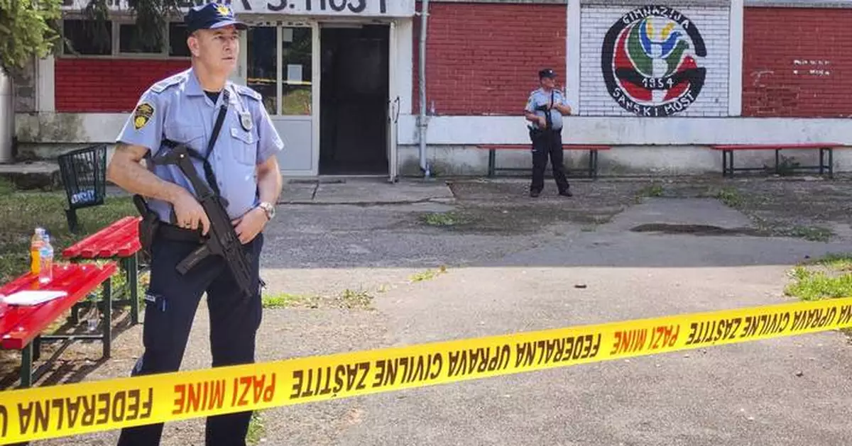 School employee kills at least 3 people in a Bosnian town, police say