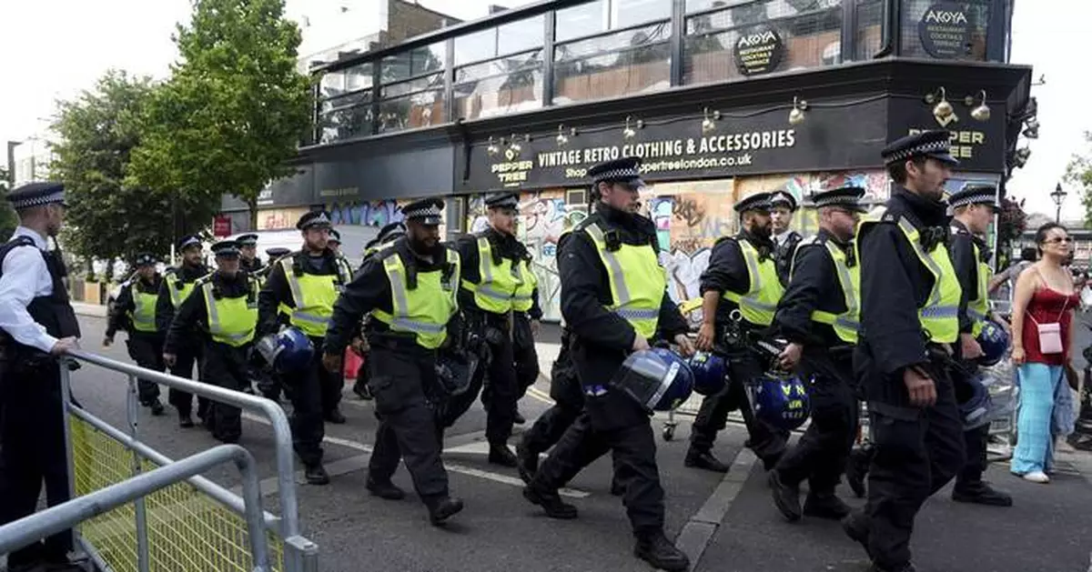 Police say 2 people who were attacked during London's Notting Hill Carnival have died