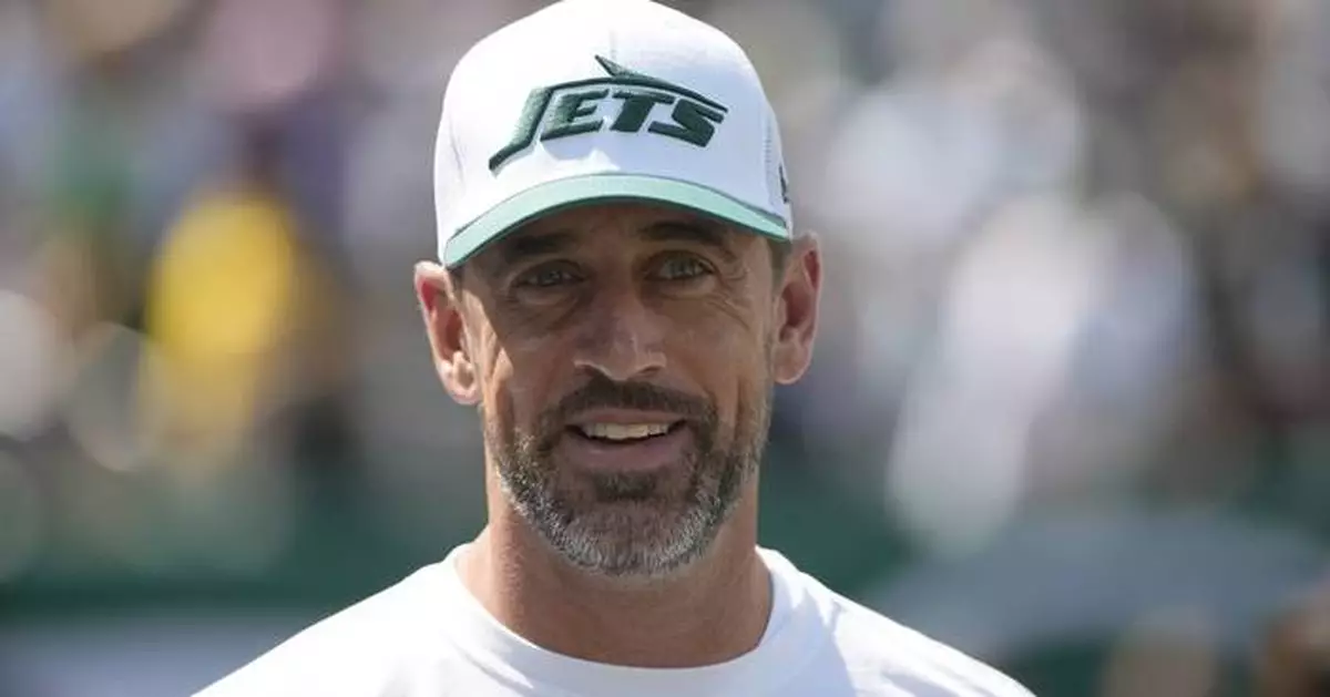 Aaron Rodgers won't judge Haason Reddick for his holdout, but says being on the Jets is best for him