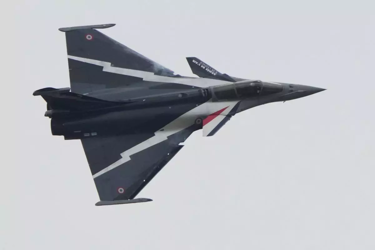 FILE - The Dassault Rafale jet performs a demonstration flight during the Paris Air Show in Le Bourget, north of Paris, France, Monday, June 19, 2023. Two fighter jet pilots were killed when their Rafale fighter plane collided with another and crashed in northeastern France on Wednesday, Aug. 14, 2024, according to the French military. The pilot of the other jet was able to eject and suffered minor injuries. (AP Photo/Lewis Joly, File)