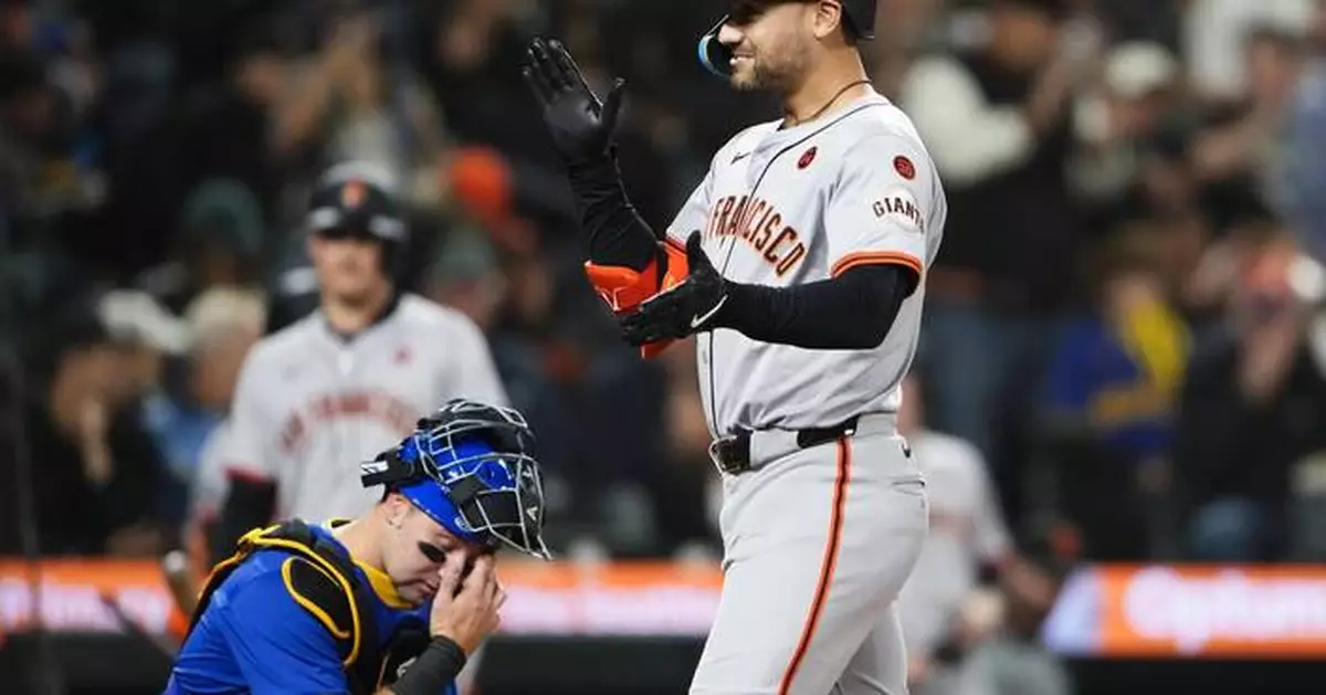 Mariners rally late to beat Giants 6-5 in 10 and give manager Dan Wilson a victory in his debut