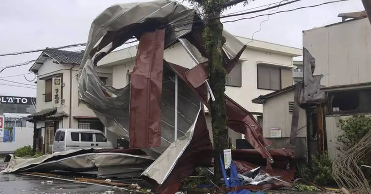 Strong storm lashes Japan with torrential rains and strong winds on its slow crawl northeast