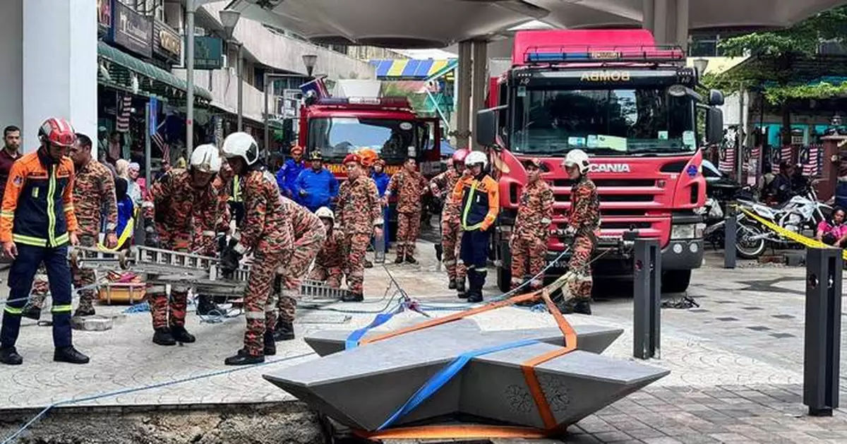 Woman from India disappears down a sinkhole in Malaysia's capital