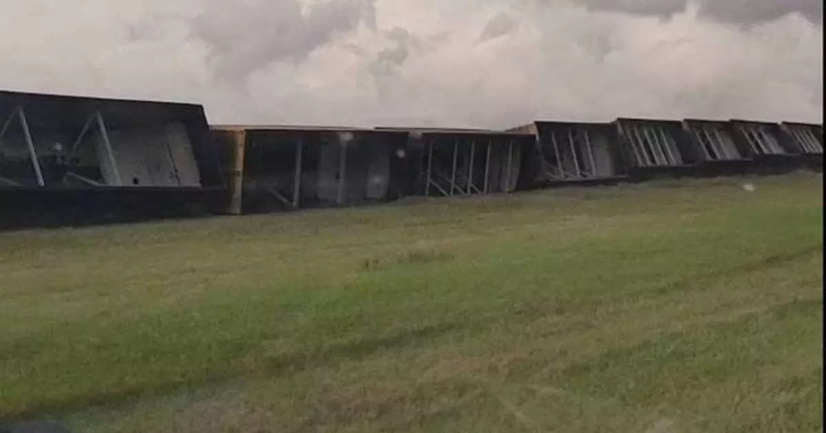 High winds, possibly from a tornado, derail 43 train cars in North Dakota