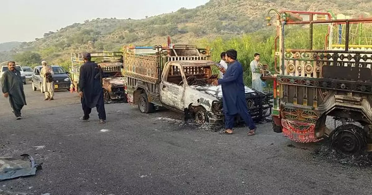 Gunmen kill dozens in multiple attacks in one of the deadliest days in a Pakistani province