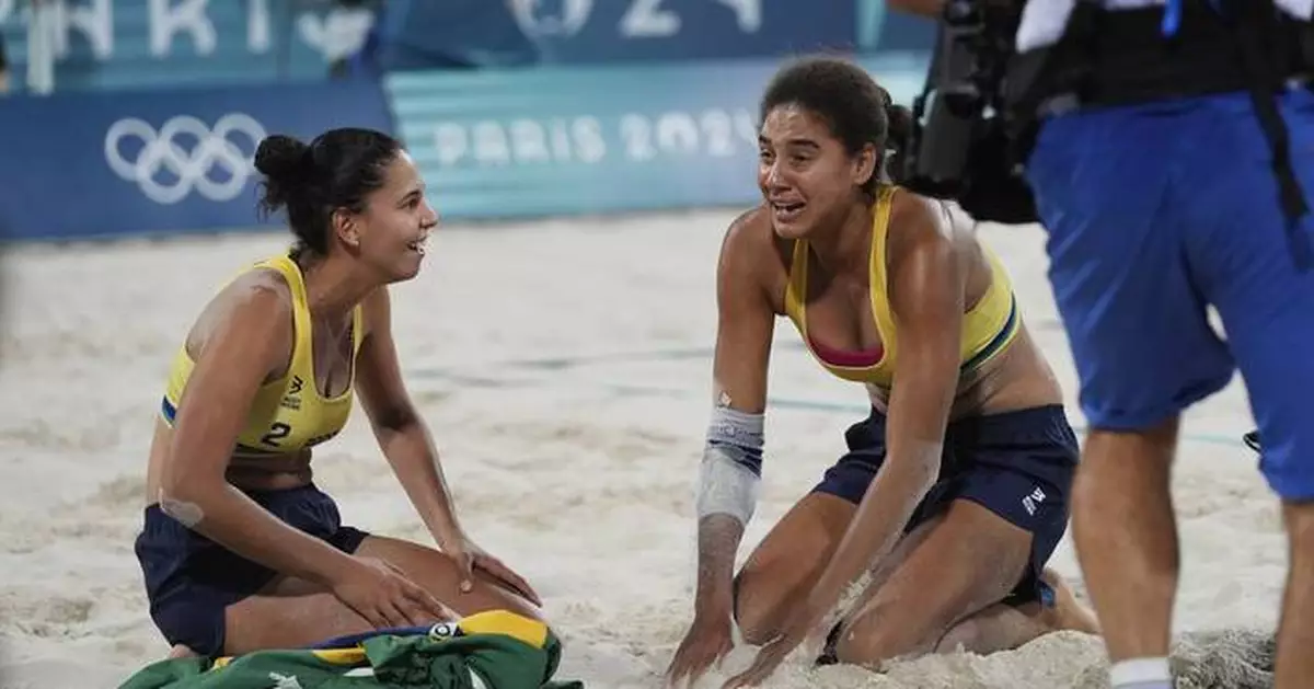 Brazil beats Canada in tense three-set women's beach volleyball gold medal match. Swiss win bronze