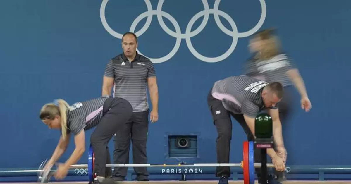 Like pit crews but in weightlifting. How loaders keep the Olympic sport going