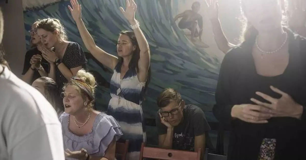 At this church in Portugal,  parishioners surf before they worship